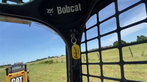 bobcat skid steer hopping down the bunny trail|bobcat controls jumping.